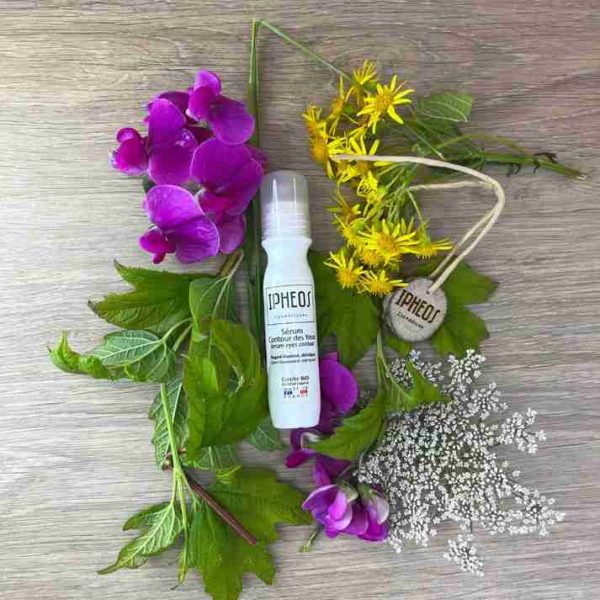 Ipheos serum contour des yeux sur fleurs